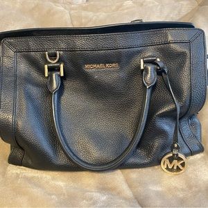 Beautiful large black leather Micheal Korrs bag.